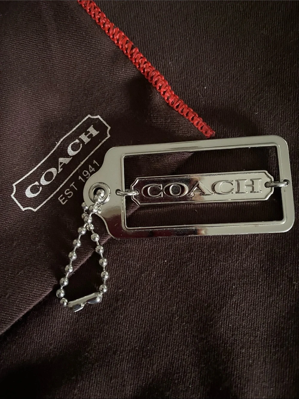 Coach Silver-tone Logo Hang Tag